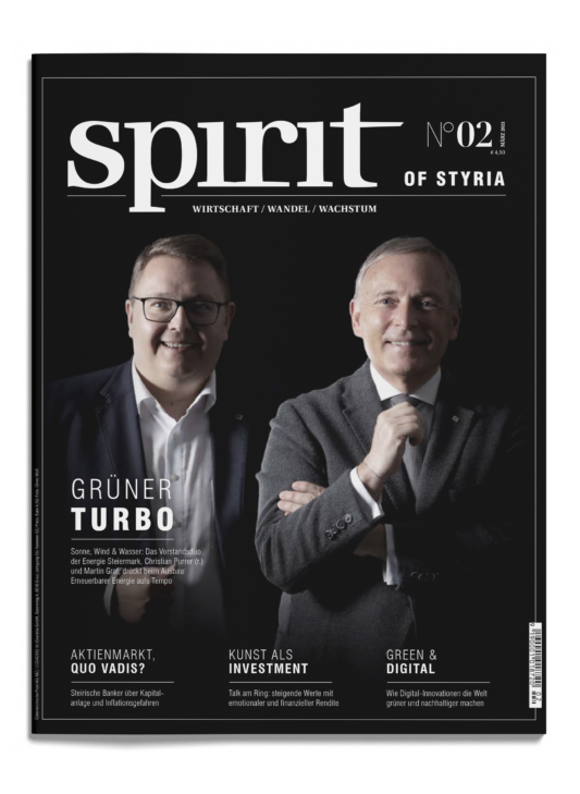 Zwei Männer in Anzügen lächeln in die Kamera auf dem Titelblatt des Magazins "spirit of STYRIA", Ausgabe 02, mit deutschen Schlagzeilen über Wirtschaft und Wachstum.