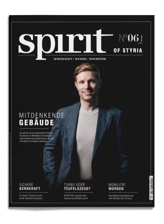 Ein Mann in blauem Blazer und grauem Hemd lächelt auf dem Cover des Magazins "spirit of styria", Ausgabe 06, mit verschiedenen Artikelüberschriften in deutscher Sprache.