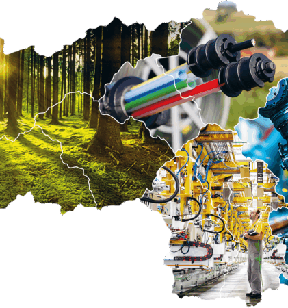 Ein Kartenausschnitt, der mit Bildern gefüllt ist: ein sonnenbeschienener Wald auf der linken Seite, Fertigungsmaschinen und Fließbänder in der Mitte und blau gefärbte Automobilteile und -technik auf der rechten Seite.