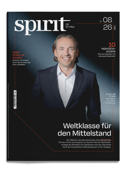 Titelseite einer Zeitschrift mit einem lächelnden Mann im Anzug und Schlagzeilen zum „Spirit Start-up Award“, zu Hightech-Materialien und zur digitalen Verwaltung.